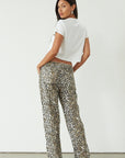 Printed jeans. Button and zipper fly. Five pocket construction. Unlined. cheetah pants. cheetah jeans. leopard jeans. leopard pants