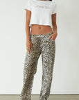 Printed jeans. Button and zipper fly. Five pocket construction. Unlined. cheetah pants. cheetah jeans. leopard jeans. leopard pants