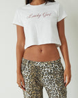 Graphic printed knit crop tee. Crewneck. Short sleeves. Unlined. white graphic tee. lucky girl t=graphic tee. summer top. basic top. basic tshirt. basic tee. cropped graphic tee