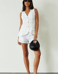 Woven shorts. Button and zipper fly. Side pockets. Faux back pockets. Fully lined. white shorts. white linen shorts. summer shorts. summer bottoms. summer outfit