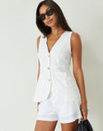 Woven sleeveless top. Front button down closure. Front pockets. Fully lined. white vest top. summer top. summer outfit. cute casual. cute but comfy top
