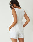 Woven shorts. Button and zipper fly. Side pockets. Faux back pockets. Fully lined. white shorts. white linen shorts. summer shorts. summer bottoms. summer outfit