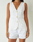 Woven sleeveless top. Front button down closure. Front pockets. Fully lined. white vest top. summer top. summer outfit. cute casual. cute but comfy top
