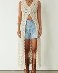 Relax fit mid-length denim shorts. Button fly. Five pocket construction. Raw hem. Unlined. denim shorts. light wash denim shorts. medium wash denim shorts