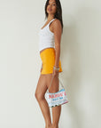 orange mini skirt. summer bottoms. summer skirt. going out outfit. going out skirt. summer outfit