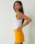 orange mini skirt. summer bottoms. summer skirt. going out outfit. going out skirt. summer outfit