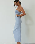 Knit maxi dress. Adjustable straps. Ruched bust. Back hook and eye and zipper closures. Partially lined. blue maxi dress. wedding guest dress. summer maxi dress