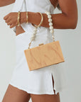 Acrylic rectangular bag. Removable beaded top strap. Top closure. Fully lined. box shape clutch. billini clutch.