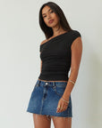 Denim skirt. Button and zipper fly. Five pocket construction. Raw edge hem. Unlined. mid wash denim skirt. dark wash denim skirt. denim mini skirt. summer skirt