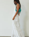 Crinkle woven tiered maxi dress. Adjustable halter tie neckline. Back hook and eye and zipper closures. Fully lined. white maxi dress. wedding guest dress. evening dress. vacation dress. fancy dinner dress. engagement dress. bridal shower dress.