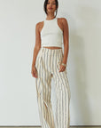 Striped woven pants. Hook and eye and zipper fly. Side pockets. Unlined. beige striped pant. work pant. casual work pant. vacation outfit. vacation pant.