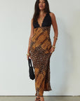 Printed chiffon maxi dress. Adjustable crisscross back straps. Lace cups. Unlined. leopard dress. leopard maxi dress. vacation dress. fancy dinner dress.