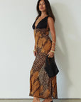 Printed chiffon maxi dress. Adjustable crisscross back straps. Lace cups. Unlined. leopard dress. leopard maxi dress. vacation dress. fancy dinner dress.