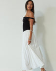 Colorblocked maxi dress. Knit bodice. Woven skirt. Twisted straps. Fully lined. white and black maxi dress. off the shoulder dress. twist strap