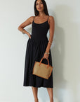 Knit midi dress. Ribbed knit bodice. Adjustable straps. Partially lined. Black midi dress. summer dress.