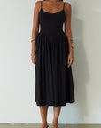 Knit midi dress. Ribbed knit bodice. Adjustable straps. Partially lined. Black midi dress. summer dress.