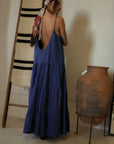 Tiered denim maxi dress. Adjustable straps. V-neckline. Front slit. Low back. Unlined. European summer aesthetic. Tuscany outfit inso. Tuscany aesthetic. Summer dress. denim maxi dress. summer outfit. everyday dress. vacation dress. outfit to wear to tuscany. day dress.