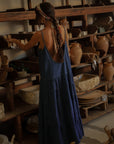 Tiered denim maxi dress. Adjustable straps. V-neckline. Front slit. Low back. Unlined. European summer aesthetic. Tuscany outfit inso. Tuscany aesthetic. Summer dress. denim maxi dress. summer outfit. everyday dress. vacation dress. outfit to wear to tuscany. day dress.