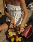 Ruffle knit romper. Strapless elastic neckline. Unlined. European summer outfit. European summer. European summer romper. European summer aesthetic. Tuscany outfit inso. Tuscany aesthetic. Summer romper. white romper. white ruffle romper. summer outfit. everyday romper. vacation romper. outfit to wear to tuscany. strapless romper