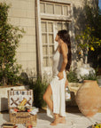 Ribbed knit maxi dress. Fixed straps. Faux front button down closure. Unlined. European summer. European summer dress. European summer aesthetic. Tuscany outfit inso. Tuscany aesthetic. Summer dress. white dress. white maxi dress. summer outfit. everyday dress. vacation dress. outfit to wear to tuscany. cover up. beach cover up. dress cover up