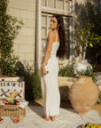 Ribbed knit maxi dress. Fixed straps. Faux front button down closure. Unlined. European summer. European summer dress. European summer aesthetic. Tuscany outfit inso. Tuscany aesthetic. Summer dress. white dress. white maxi dress. summer outfit. everyday dress. vacation dress. outfit to wear to tuscany. cover up. beach cover up. dress cover up