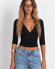 black Soft V neck top
3/4 sleeve top
V neckline
Unlined