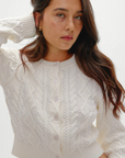 white Cable knit cardigan sweater
Snug feel with a slightly cropped fit
Crafted with custom Frankies Bikinis buttons
Ribbed detailing on hem, sleeve openings, and neckline
Cotton
fall sweater
fall cardigan
fall outfit