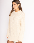 Cable knit sweater dress. Crewneck. Long cuffed sleeves. Unlined. beige sweater dress. fall sweater dress. holiday look