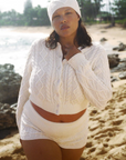 white Cable knit cardigan sweater
Snug feel with a slightly cropped fit
Crafted with custom Frankies Bikinis buttons
Ribbed detailing on hem, sleeve openings, and neckline
Cotton
fall sweater
fall cardigan
fall outfit