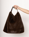 brown Faux fur tote
One inner zip pocket
Two inner slip pockets
Button closure
Imported
Polyester
brown fur bag
fall bag
fall accessories