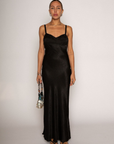 Textured black satin maxi dress. Adjustable elastic straps. Back hook and eye and zipper closures. Partially lined. black wedding guest dress
