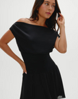 Stretchy knit midsection
Contrasted by lightweight chiffon through the neckline, bodice, and skirt
Wide neckline
Sits naturally as a boat neck and can be styled on or off the shoulders
Double layer skirt
Polyester
black mini dress