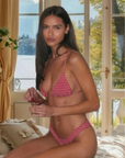 red Gingham printed triangle bikini top
Adjustable over the shoulder straps
Lined
Nylon/Spandex