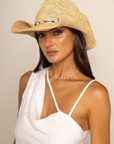 Raffia cowboy hat
Conch shell brim
Bendable
Adjustable inner drawstring