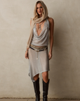 silver Metallic halter top
Cowl neckline
Adjustable neck and back tie
Unlined/Sheer