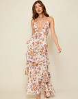 Floral printed eyelet woven tiered maxi dress. Adjustable straps. Front drawstring closure. Back cut out. Elastic back strap. Back hook and eye and zipper closures. Fully lined. Guest wedding dress. Floral dress. Coquette dress.