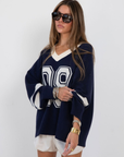 navy 09' graphic sweater jersey top
V neckline
Unlined
campus jersey sweater