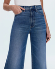 Relaxed, ultra wide leg silhouette
High rise waist
Comfort stretch denim
Waist: 26" / Rise: 12" / Length: 33"
Cotton/Spandex
medium wash blue denim jeans