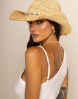 Raffia cowboy hat
Conch shell brim
Bendable
Adjustable inner drawstring