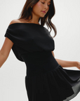 Stretchy knit midsection
Contrasted by lightweight chiffon through the neckline, bodice, and skirt
Wide neckline
Sits naturally as a boat neck and can be styled on or off the shoulders
Double layer skirt
Polyester
black mini dress