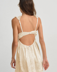 cream Satin slip mini dress with lace detailing
Crafted in a chic floral jacquard
Adorned with lace trims
Ruched underwire cups
Low drawstring back
Skinny chiffon tie bows and rosettes throughout
Unlined
Adjustable shoulder straps
Hook and eye closure at center-back
Polyester/Elastane
lingerie slip dress