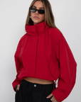 red Funnel neck windbreaker jacket
Track jacket
Button closure
Cinchable waist
2 front pockets
Lined
fall transition outfit
