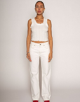 Eyelet pointelle tank top
Ruffle trim detail
Racerback
Scoop neckline
Has stretch
Unlined/partial sheer
White basic tank top