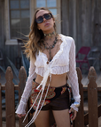 white Textured knit mesh crop top
Ruffle trim
Front tie closures
Long sleeves
Partially lined
coachella top
stagecoach top
festival outfit
boho top
boho outfit