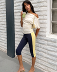 Track pant capri pant
Elastic waistband
2 toned
Unlined
blue and yellow capri pant