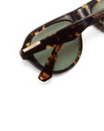 Oversized aviator frame
Featuring a straight brow line
Teardrop-shaped lenses
Distinctive keyhole bridge
Thick, structured frame with sculptural finish
tortoise frame and green lens aviator sunglsses