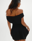 Stretchy knit midsection
Contrasted by lightweight chiffon through the neckline, bodice, and skirt
Wide neckline
Sits naturally as a boat neck and can be styled on or off the shoulders
Double layer skirt
Polyester
black mini dress