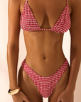 red Gingham printed triangle bikini top
Adjustable over the shoulder straps
Lined
Nylon/Spandex