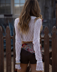 white Textured knit mesh crop top
Ruffle trim
Front tie closures
Long sleeves
Partially lined
coachella top
stagecoach top
festival outfit
boho top
boho outfit