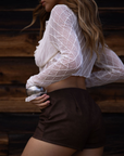 white Textured knit mesh crop top
Ruffle trim
Front tie closures
Long sleeves
Partially lined
coachella top
stagecoach top
festival outfit
boho top
boho outfit